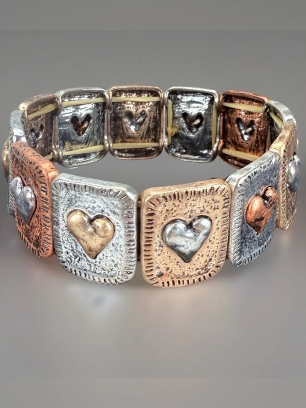 Multi tone metal heart bohemian chic stretch bracelet